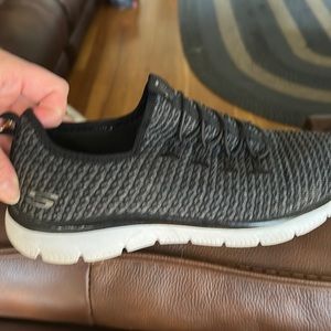 Lightweight memory foam Skechers. Easy to slip on and easy to wash.